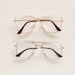 Three pairs of glasses on a white background.